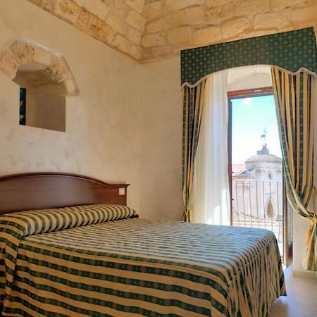 Rooms Dimora Arco - Affitti Brevi Italia Monte SantʼAngelo Екстериор снимка