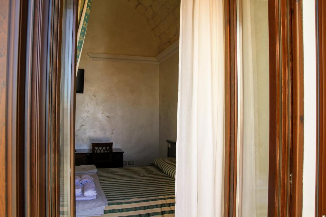 Rooms Dimora Arco - Affitti Brevi Italia Monte SantʼAngelo Екстериор снимка