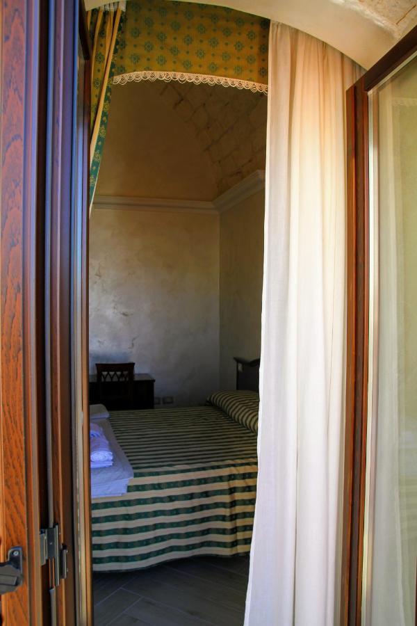 Rooms Dimora Arco - Affitti Brevi Italia Monte SantʼAngelo Екстериор снимка
